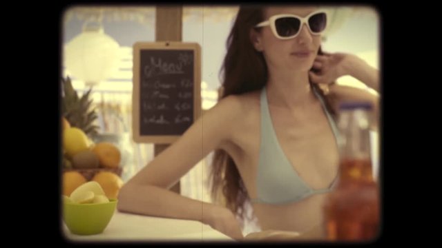 Cheerful girls at the beach bar vintage shooting