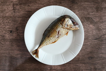 Fried Mackerel on White Dish 