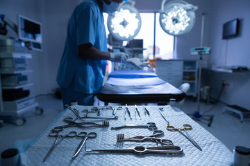 Surgical instruments arranged on table in operating room of hospital