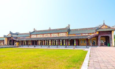 Long feudal house with wooden architecture, colorful roof tiles decoration where mandarins, meetings and recognized as a national cultural heritage in Hue, Vietnam