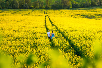 Romantic date in the spring nature. Couple in love enjoying in the nature