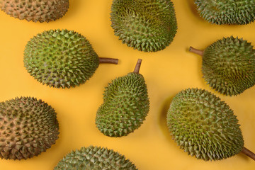durian  on bright yellow background