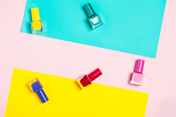 Nail polish bottles pattern background. Close up.