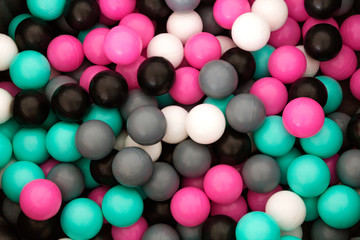 Multi-colored plastic balls for children's games, for the pool
