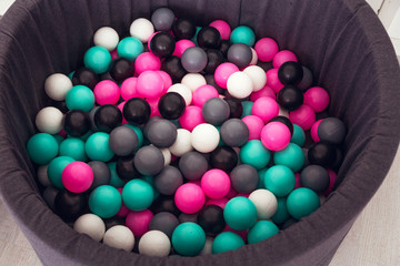 Children's pool with plastic balls. View from above