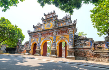 Fototapeta premium Colorful imperial city gate. This is lead into the forbidden city where the feudal king work Imperial Royal was in the 19th century in Hue, Vietnam