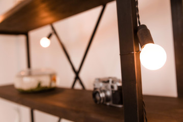 electric lamp as a decor on a bookshelf