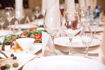 Elegant festive table setting in the restaurant