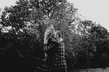 Happy loving couple outdoor in park .