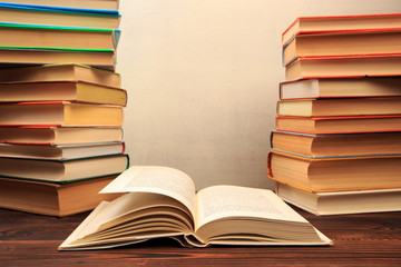 Education learning concept with opening book or textbook in old library, - Image