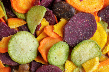 Healthy vegetable chips yellow sweet potato purple sweet potato carrot green radish green beans and shiitake mushrooms