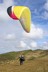 Tandem paraglider launching at Newgale, Wales