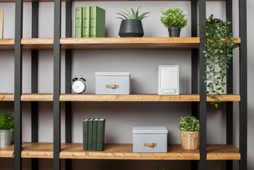 Box with folded things in the interior of the apartment