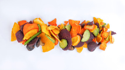 Healthy vegetable chips yellow sweet potato purple sweet potato carrot green radish green beans and shiitake mushrooms