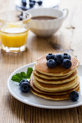 Morning meal, homemade pancakes, fresh summer berries