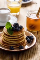 Morning meal, homemade pancakes, fresh summer berries