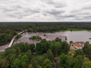 Aerial view of Gysinge with the bridge over the river Dalälven and the entrance and information to the national park. 