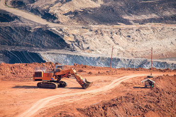 Part of a coal mine pit with big mining truck working
