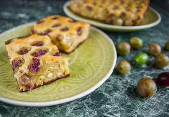 homemade gooseberry pie sliced ​​on plate