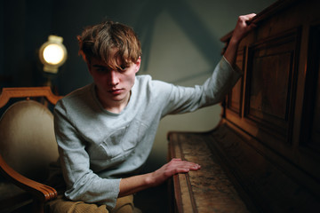 Fototapeta premium man sitting on sofa