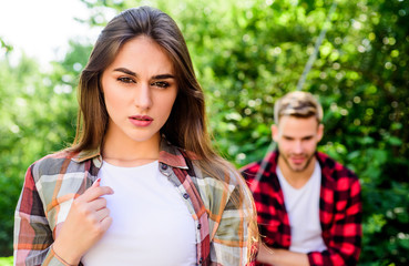 Obraz premium Feeling of love. couple in love. family weekend. romantic date. woman in selective focus with man in park. valentines day. summer camping in forest. first meet of couple outdoor. Relationship