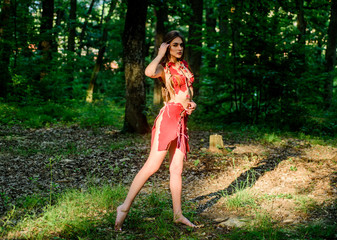 survival lessons. A delicious girl. wild woman in forest. ethnic tribal fashion. deep forest. amazon woman. sexy witch. cougar female. sexy girl in leather suede clothes. woman in wild forest