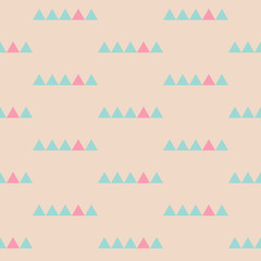 Seamless pattern with pink and blue triangles on pink background