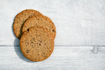 Gluten Free Oatcake on a rustic table top - suitable for vegans.