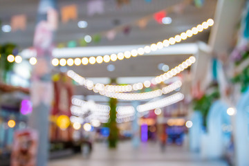 Abstract blur with bokeh and defocused shopping mall in deparment store for background