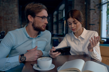 young couple in cafe