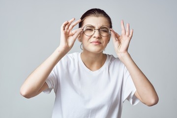 woman with hands on her head