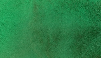Abstract green fabric texture background, blank shiny silk fabric pattern background