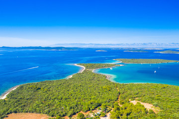 Beautiful seascape on Adriatic in Croatia, Dugi otok archipelago, yachts anchored in blue bays