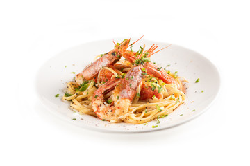 Linguine with garlic and king prawns on a plate