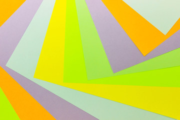 Bright unique colorful background consisting of different saturated colors. Palette of colors. Multicolor background from a paper of different colors. Geometric background of pastel tones.