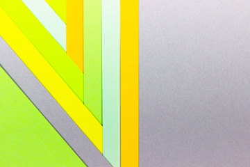 Bright unique colorful background consisting of different saturated colors. Palette of colors. Multicolor background from a paper of different colors. Geometric background of pastel tones.