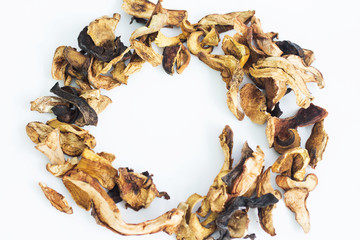 Pile of dry mushroom chips isolated