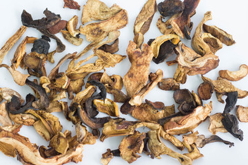 Pile of dry mushroom chips isolated full frame
