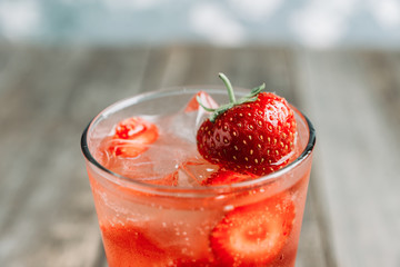 Strawberry cocktail on the rustic background. Selective focus. Shallow depth of field.