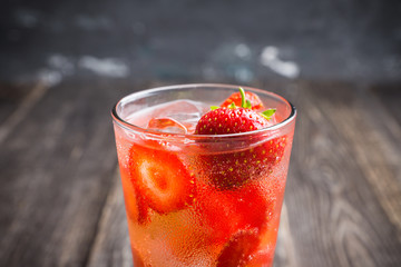 Strawberry cocktail on the rustic background. Selective focus. Shallow depth of field.