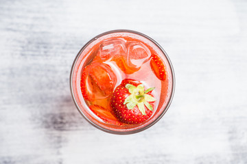 Strawberry cocktail on the rustic background. Selective focus. Shallow depth of field.