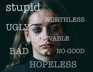 Portrait of intimidated, unhappy young girl crying helpless and depressed. Stop bullying campaign - obrazy, fototapety, plakaty