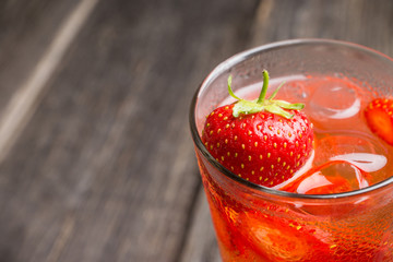 Strawberry cocktail on the rustic background. Selective focus. Shallow depth of field.