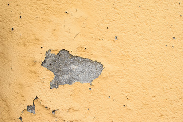 Yellow wall of plaster.