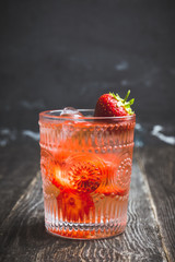 Old fashioned strawberry cocktail. Selective focus. Shallow depth of field.