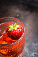 Old fashioned strawberry cocktail. Selective focus. Shallow depth of field.