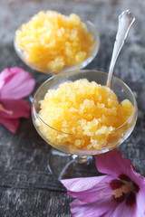 Two glass of orange granita, frozen summer dessert