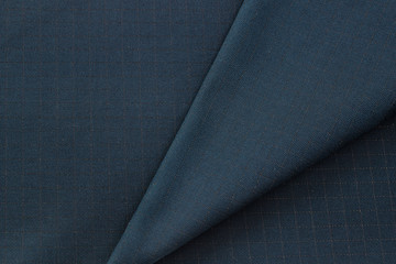 fabric with special properties, blue in large thin stripes, close-up
