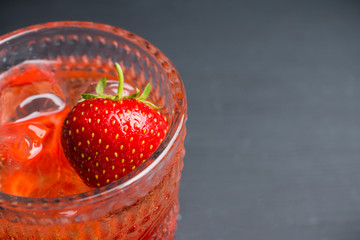 Old fashioned strawberry cocktail. Selective focus. Shallow depth of field.