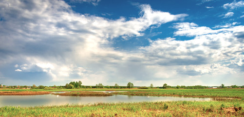 landscape with river and blue sky